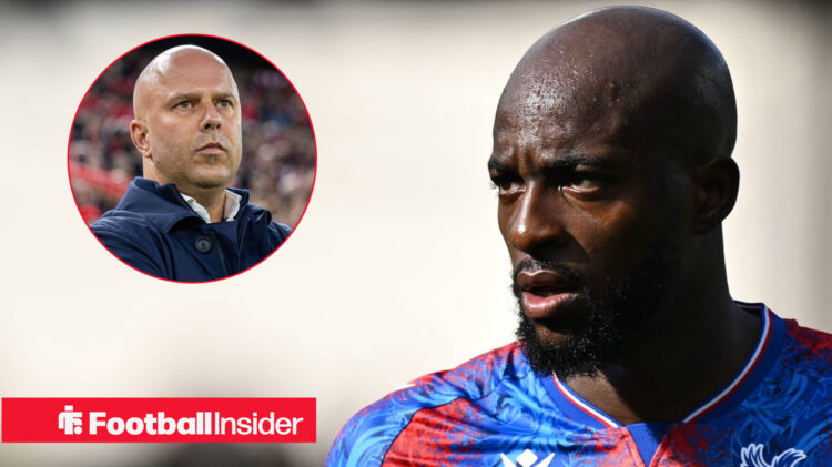 Crystal Palace striker Jean-Philippe Mateta looks across at Liverpool manager Arne Slot
