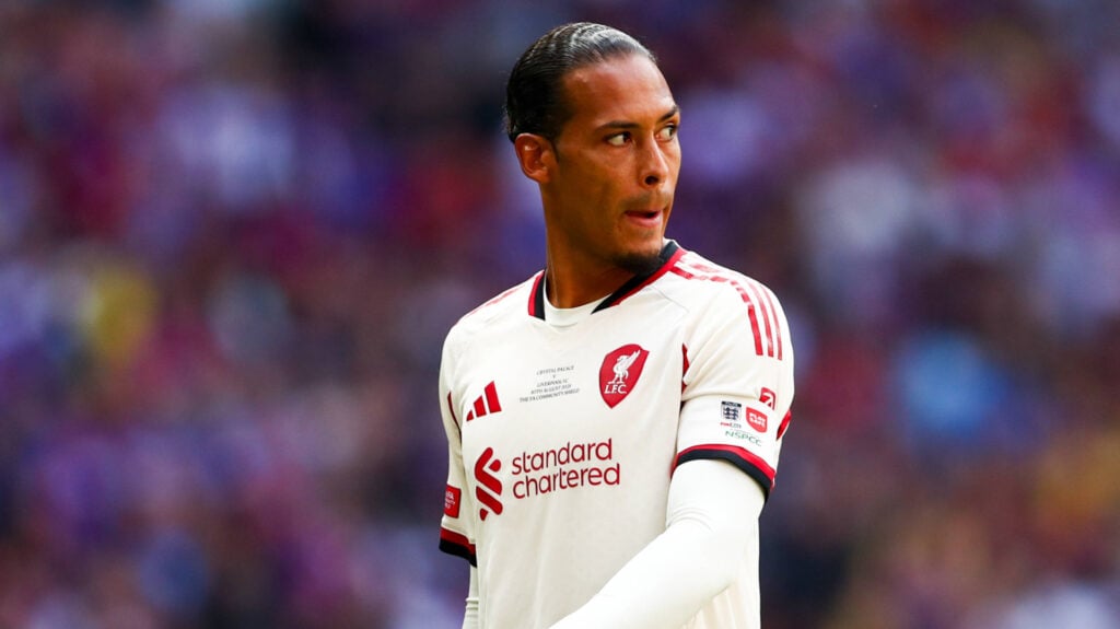 Liverpool captain Virgil van Dijk looks over his shoulder