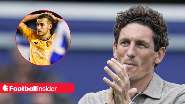 Brentford manager Keith Andrews applauds supporters next to an image of Leicester midfielder Harry Winks