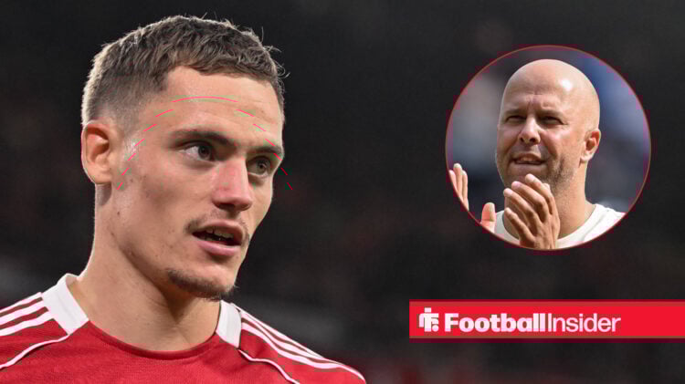 Florian Wirtz looks on during a Liverpool match as manager Arne Slot applauds