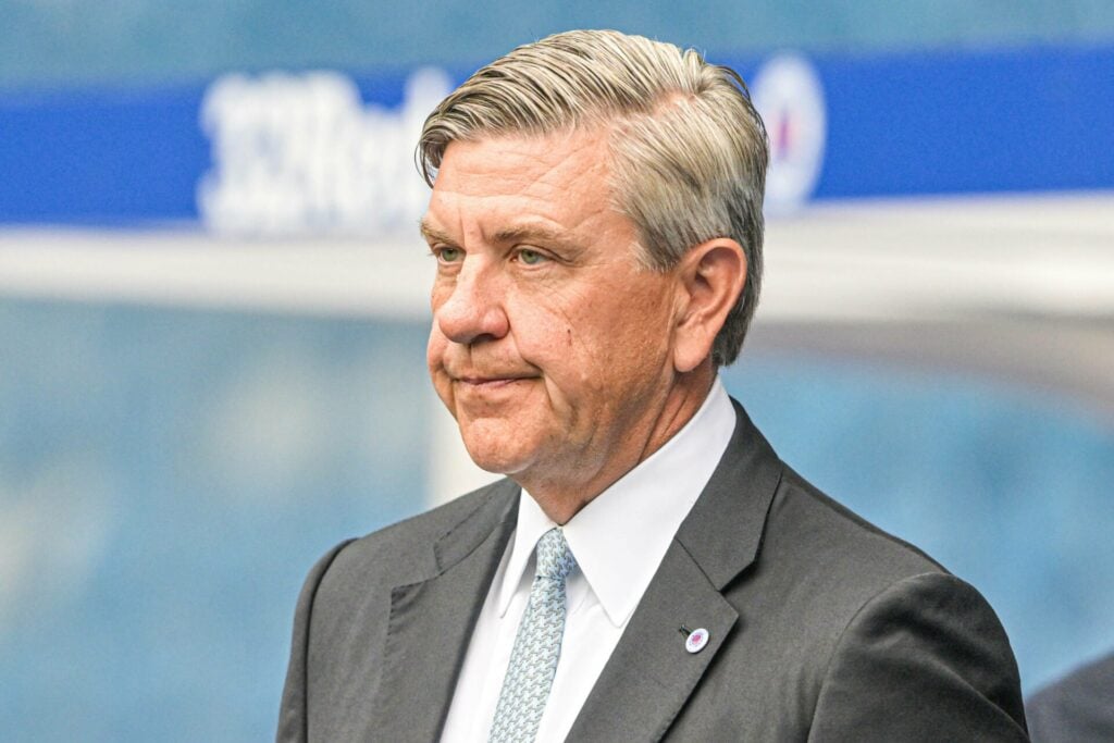 Andrew Cavenagh in a suit at Ibrox