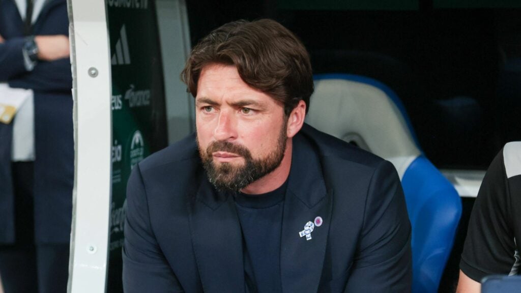 Russell Martin sat in the Ibrox dugout