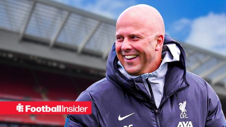 Arne Slot in a happy mood against a back drop of Anfield