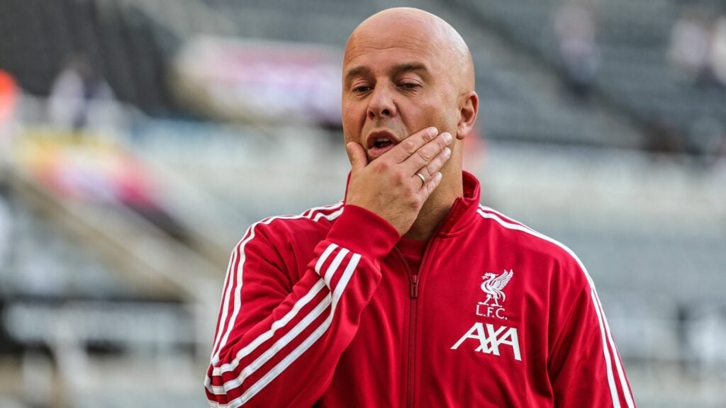 Arne Slot looks frustrated in Liverpool Adidas jacket