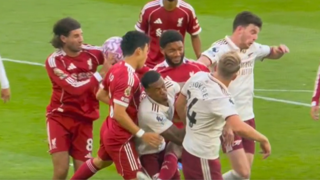 Liverpool and Arsenal players clash in the penalty area