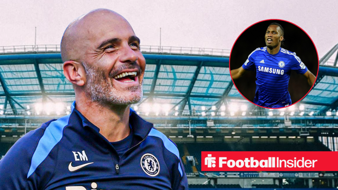 Chelsea boss Enzo Maresca smiling at an image of Didier Drogba