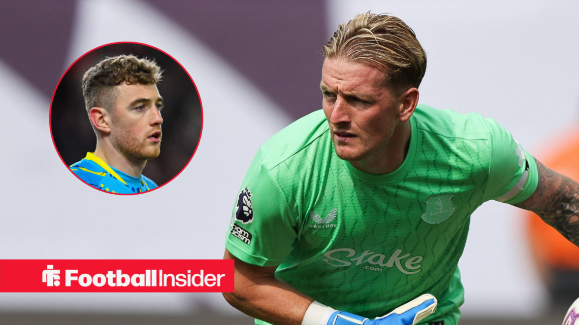 Everton's Jordan Pickford rolls the ball out facing teammate Mark Travers who is also in action