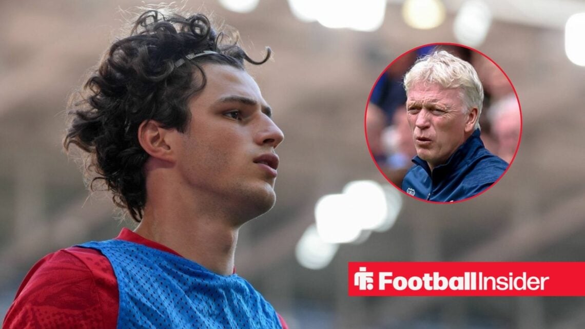 Everton's Merlin Rohl warming up with manager David Moyes shouting at him right inset