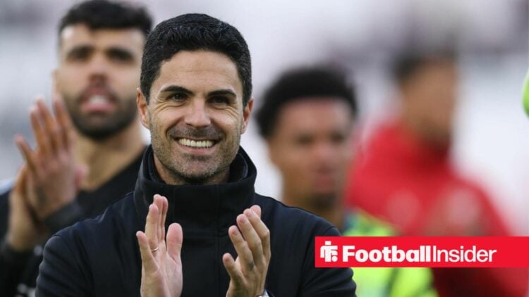 Arsenal manager Mikel Arteta smiling and clapping the Gunners support