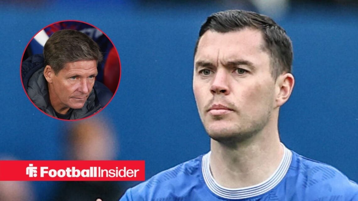 Oliver Glasner looking serious on the left with a focused Michael Keane on the right