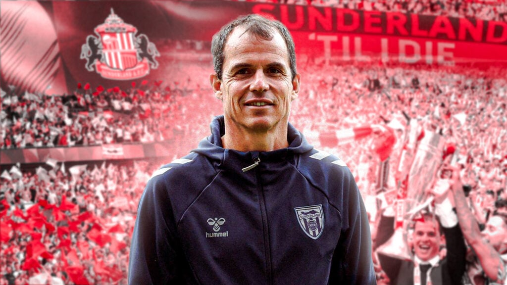 Regis Le Bris smiling in front of a joyous Sunderland crowd