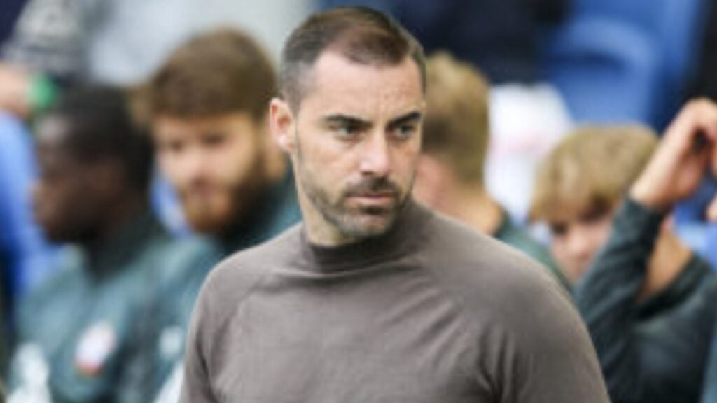 Ruben Selles wearing a grey jumper