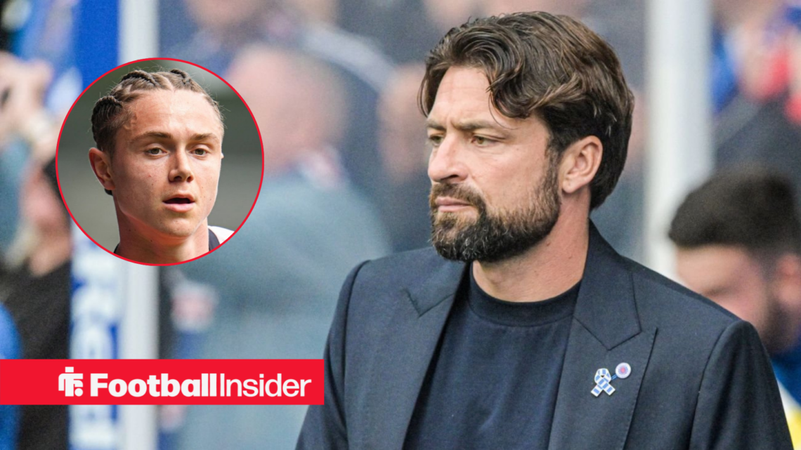 Rangers manager Russell Martin in a dugout looking at Rangers' Thelo Aasgaard in action