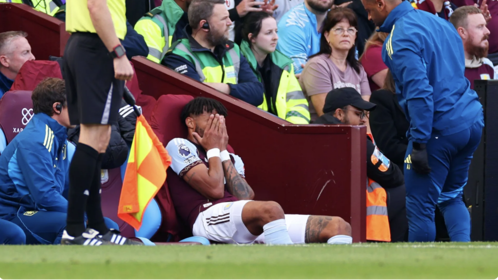 Tyrone Mings looking devastated on the Aston Villa bench.