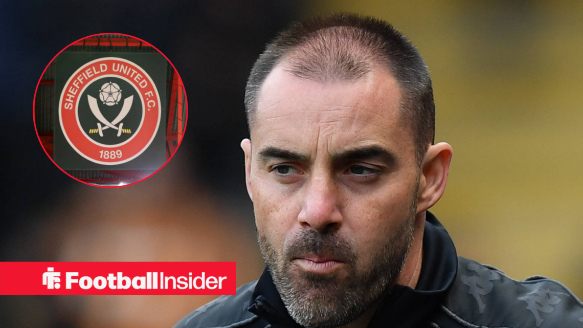 Ruben Selles standing alongside an image of a Sheffield United badge