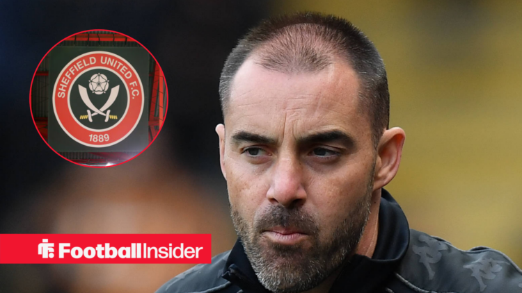 Ruben Selles standing alongside an image of a Sheffield United badge