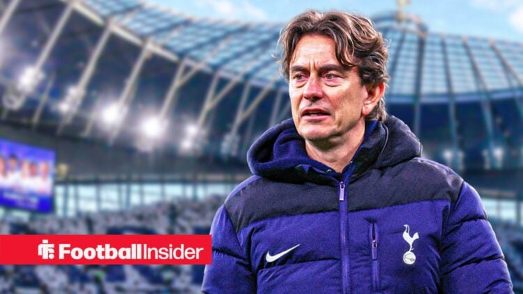Tottenham manager Thomas Frank against a backdrop of the Tottenham Hotspur Stadium.
