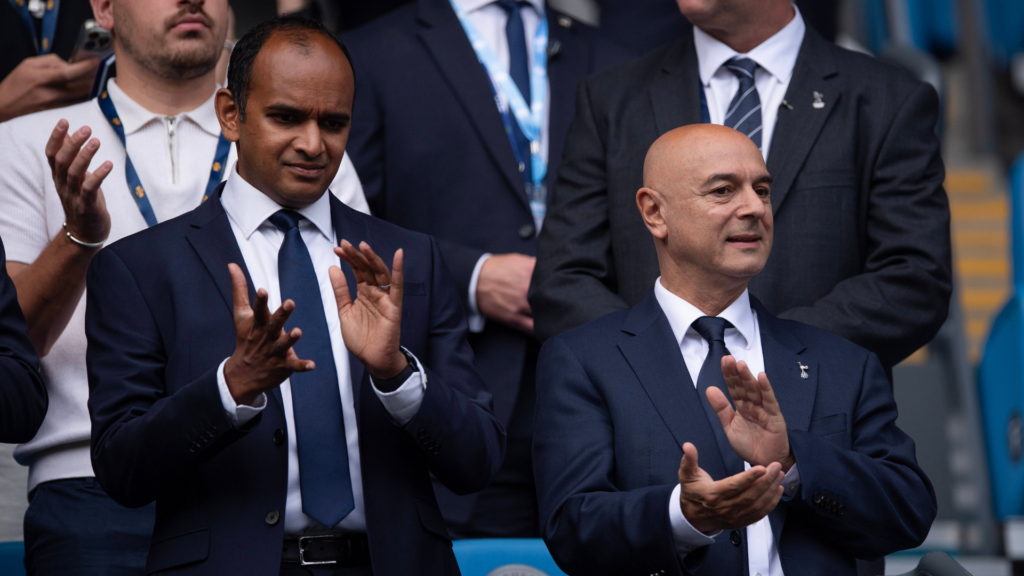 Vinai Venkatesham and Daniel Levy clapping