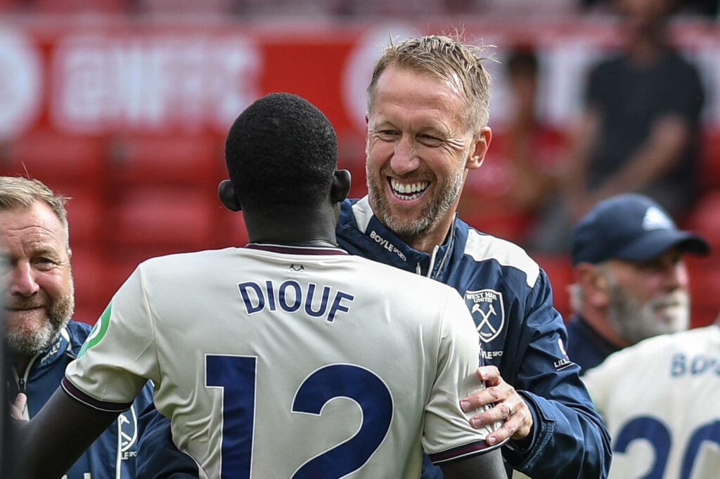 Manager Graham Potter and defender El Hadji Malick Diouf