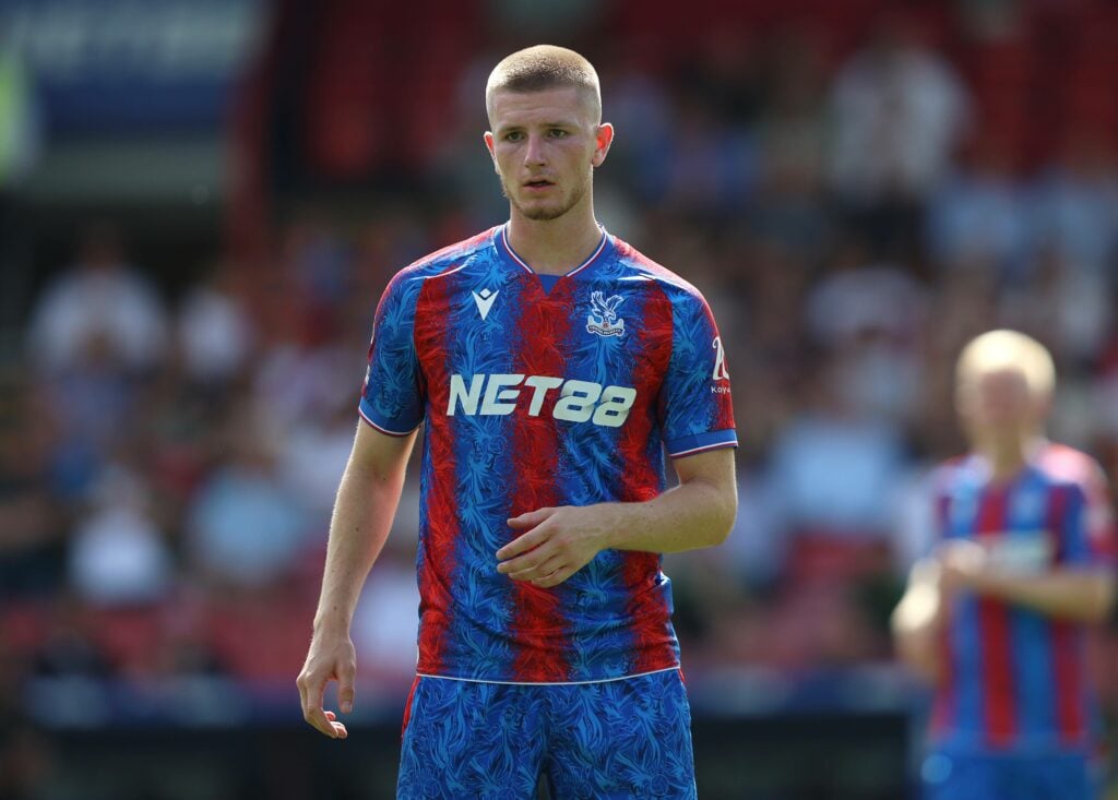 Adam Wharton rests during a Premier League game for Crystal Palace
