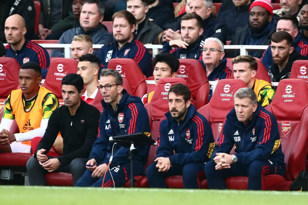 Mikel Arteta and his backroom staff on the Arsenal bench.