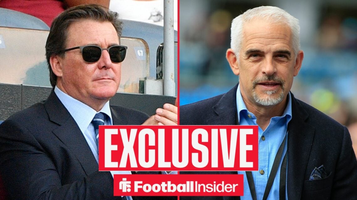 Dan Friedkin clapping alongside Alan Pace looking focused