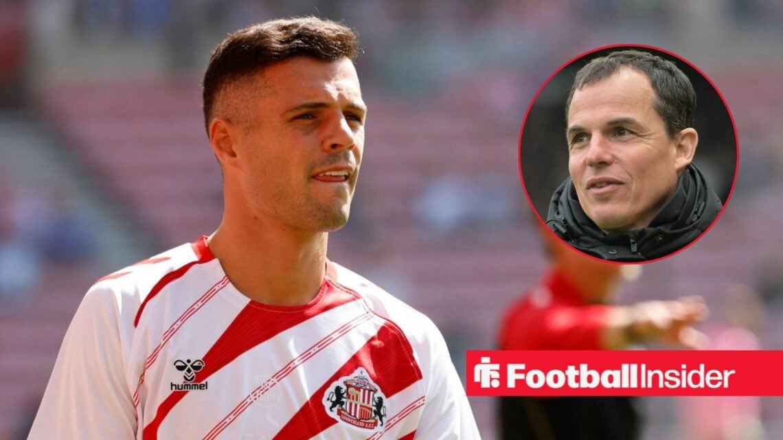 Granit Xhaka looking focused on the left with a smiling Regis Le Bris on the right