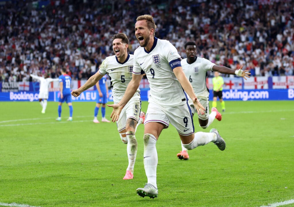 Harry Kane celebrating scoring a goal for England against Slovakia.