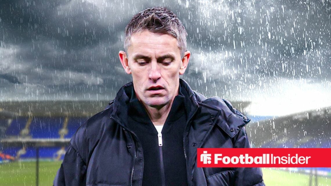 Ipswich manager Kieran McKenna against a gloomy Portman Road backdrop.