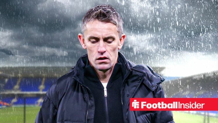 Ipswich manager Kieran McKenna against a gloomy Portman Road backdrop.