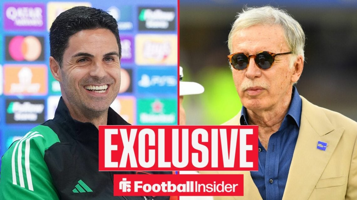 Mikel Arteta smiling alongside Stan Kroenke wearing sunglasses