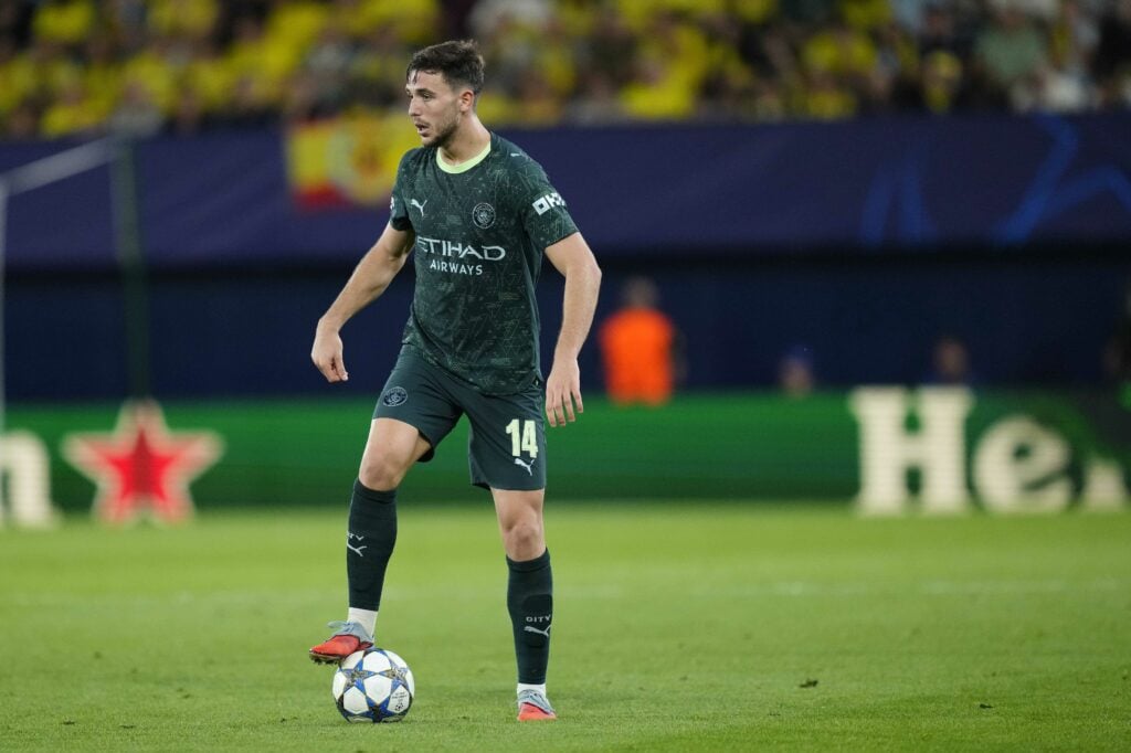 Nico Gonzalez looking focused on the ball for Man City