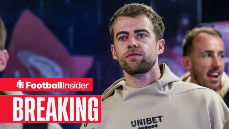 Patrick Bamford walking into a stadium with Leeds