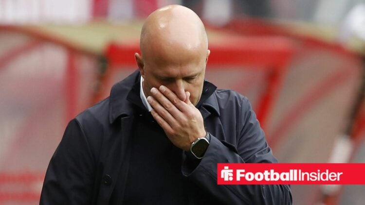 Liverpool boss Arne Slot pinching his nose