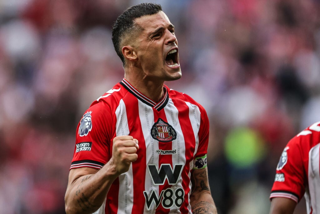Granit Xhaka shouting with joy, pumping his fist