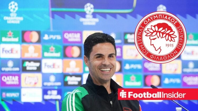 Mikel Arteta smiles during Champions League press conference with Olympiacos club badge inset