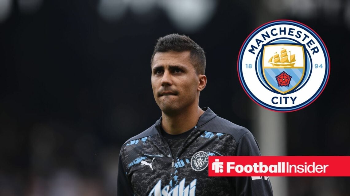 Rodri in action for Manchester City with Manchester City club badge inset