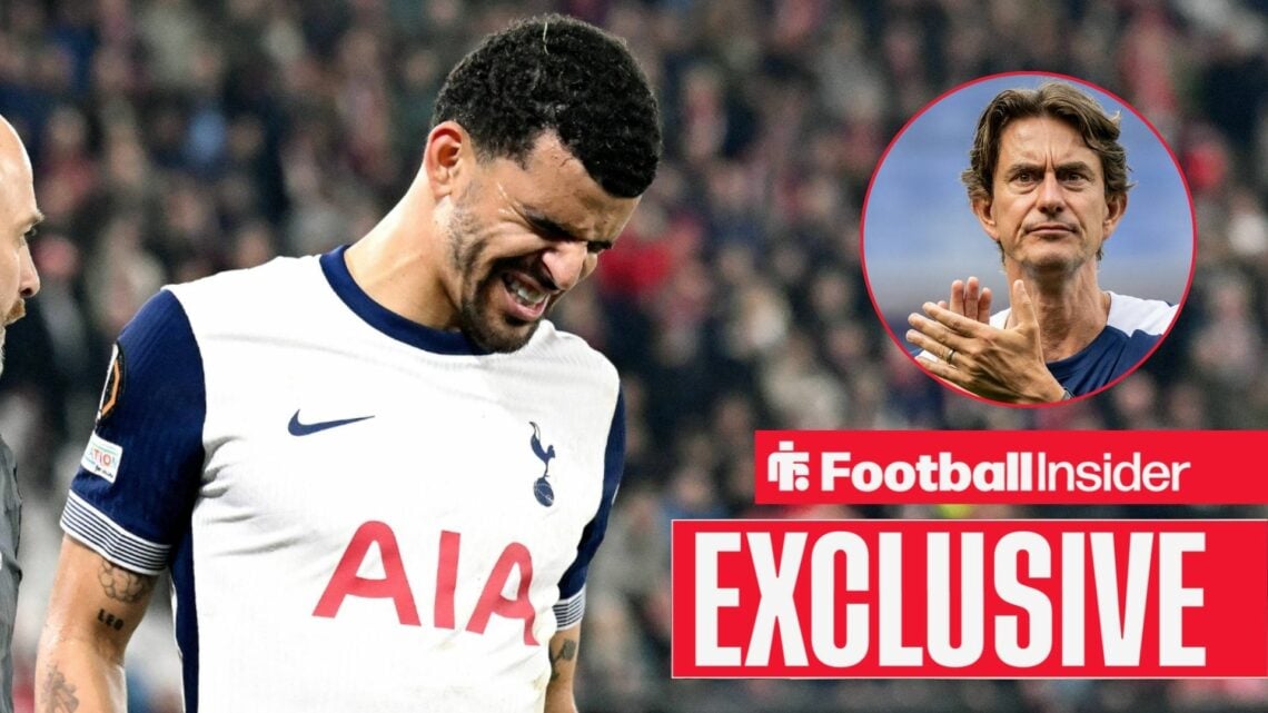 Dominic Solanke grimacing in pain on the left with Thomas Frank clapping seriously on the right