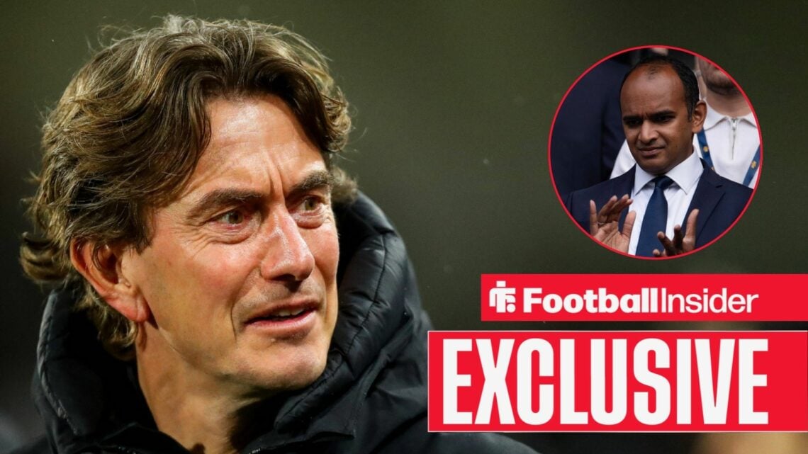 Vinai Venkatesham clapping alongside Thomas Frank