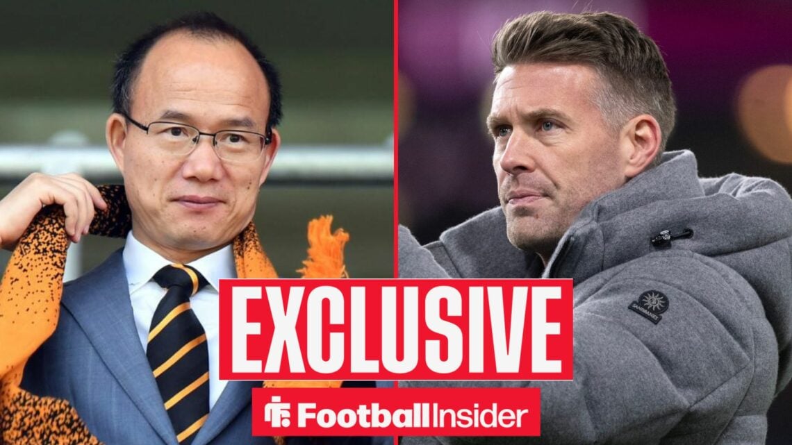 Guo Guangchang with a Wolves scarf alongside Rob Edwards looking serious