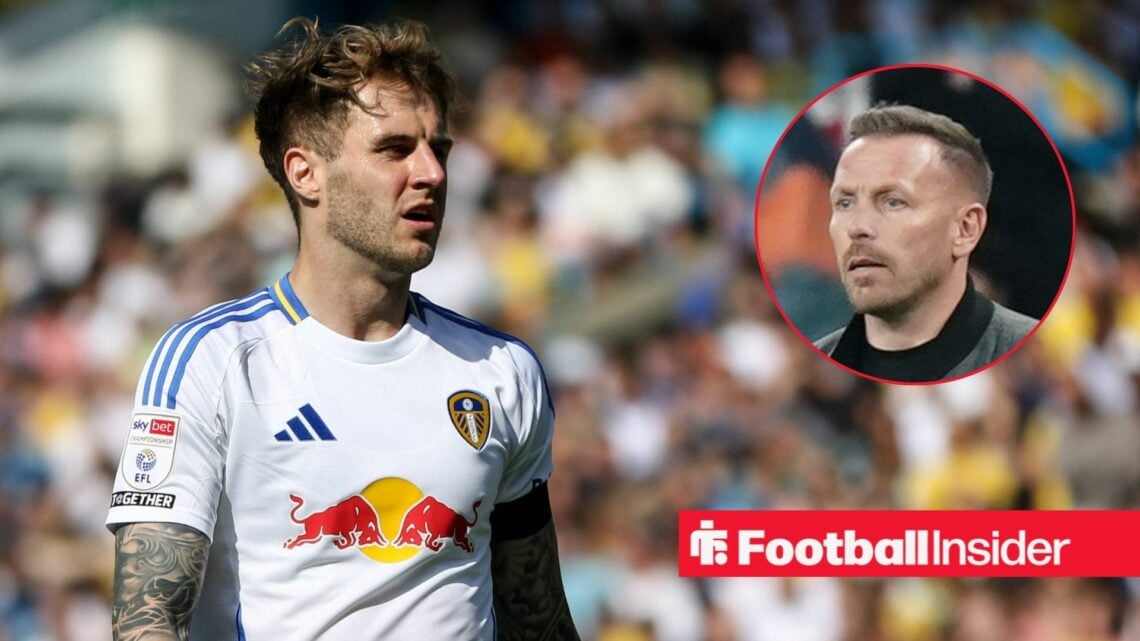 Joe Rodon looking focused on the left for Leeds with Craig Bellamy focused on the right