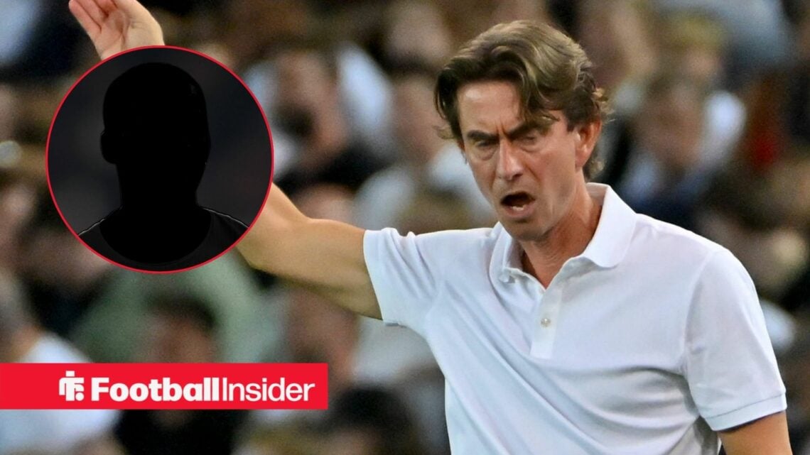 Pape Sarr's silhouette on the left with Thomas Frank shouting for Tottenham on the right