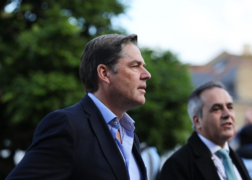 Richard Masters wearing a suit