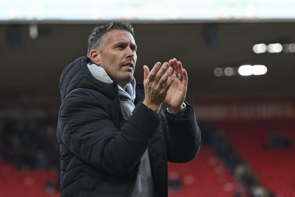 Rob Edwards clapping at the Riverside Stadium