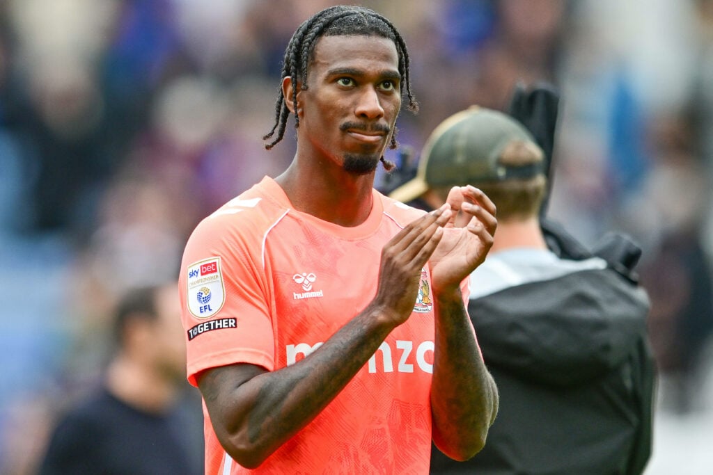 Haji Wright clapping in an orange Coventry City shirt
