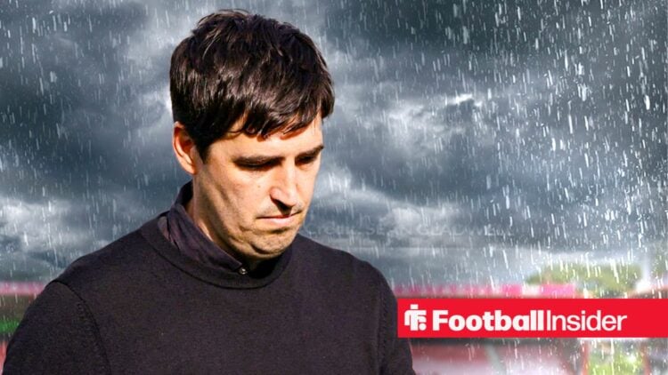 Andoni Iraola in the rain at Bournemouth