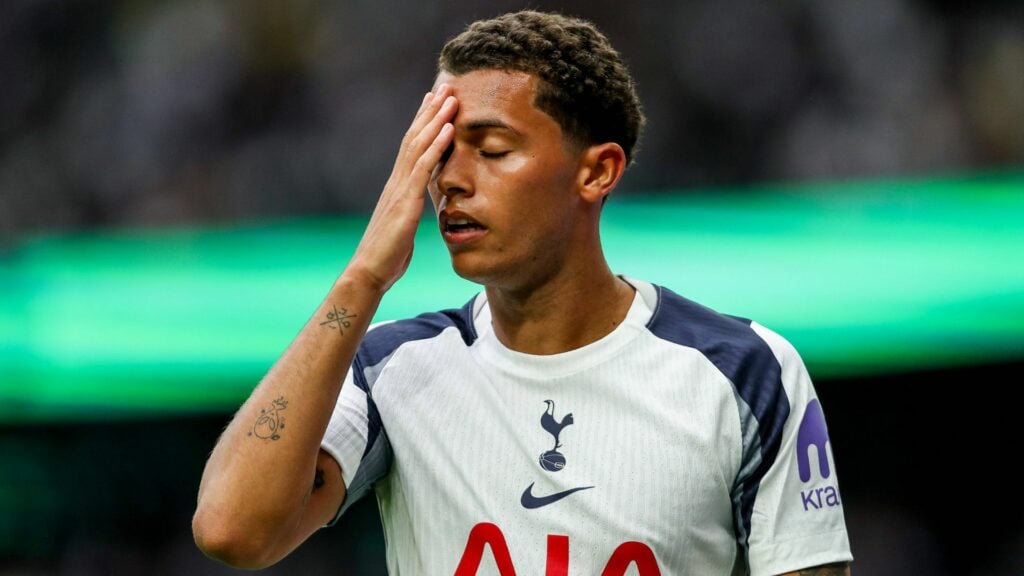 Brennan Johnson with his hand to his heads in anguish for Tottenham
