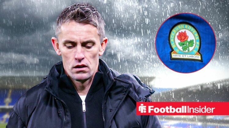 Ipswich Town manager Kieran McKenna stands in the rain as the Blackburn Rovers badge features in a circular inset.