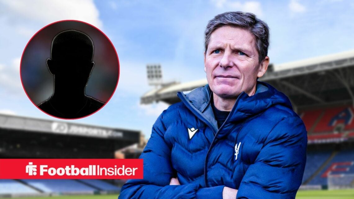 Crystal Palace manager Oliver Glasner with his arms crossed at Selhurst Park with Adam Wharton's silhouette on the left