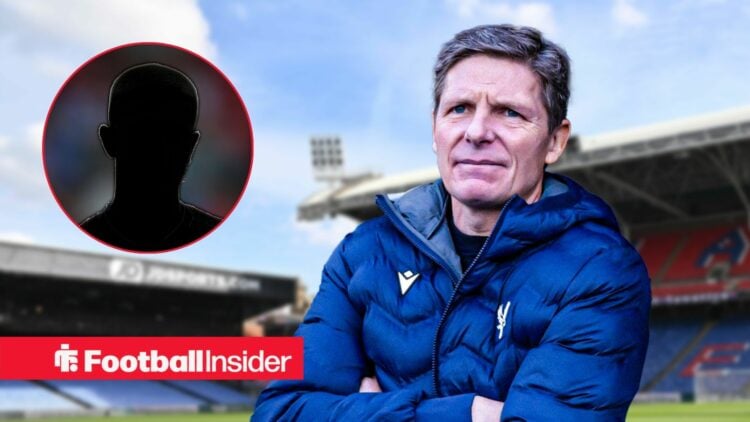 Crystal Palace manager Oliver Glasner with his arms crossed at Selhurst Park with Adam Wharton's silhouette on the left